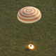 Illustration for article titled A Soyuz Capsule Returns to Earth—With a Flash